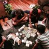 Friends Playing Legitimacy Board Game
