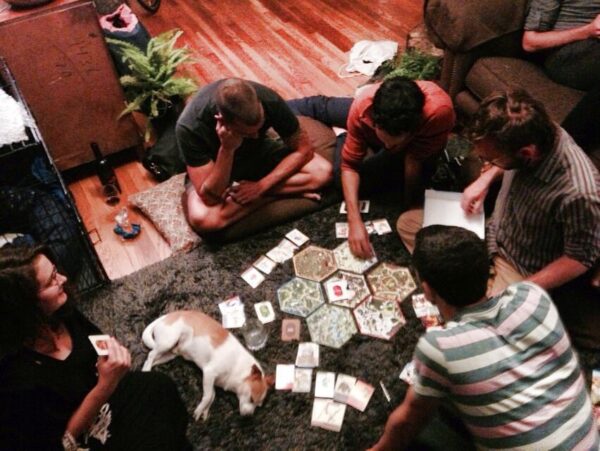 Friends Playing Legitimacy Board Game