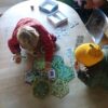 Kids Playing Legitimacy Board Game